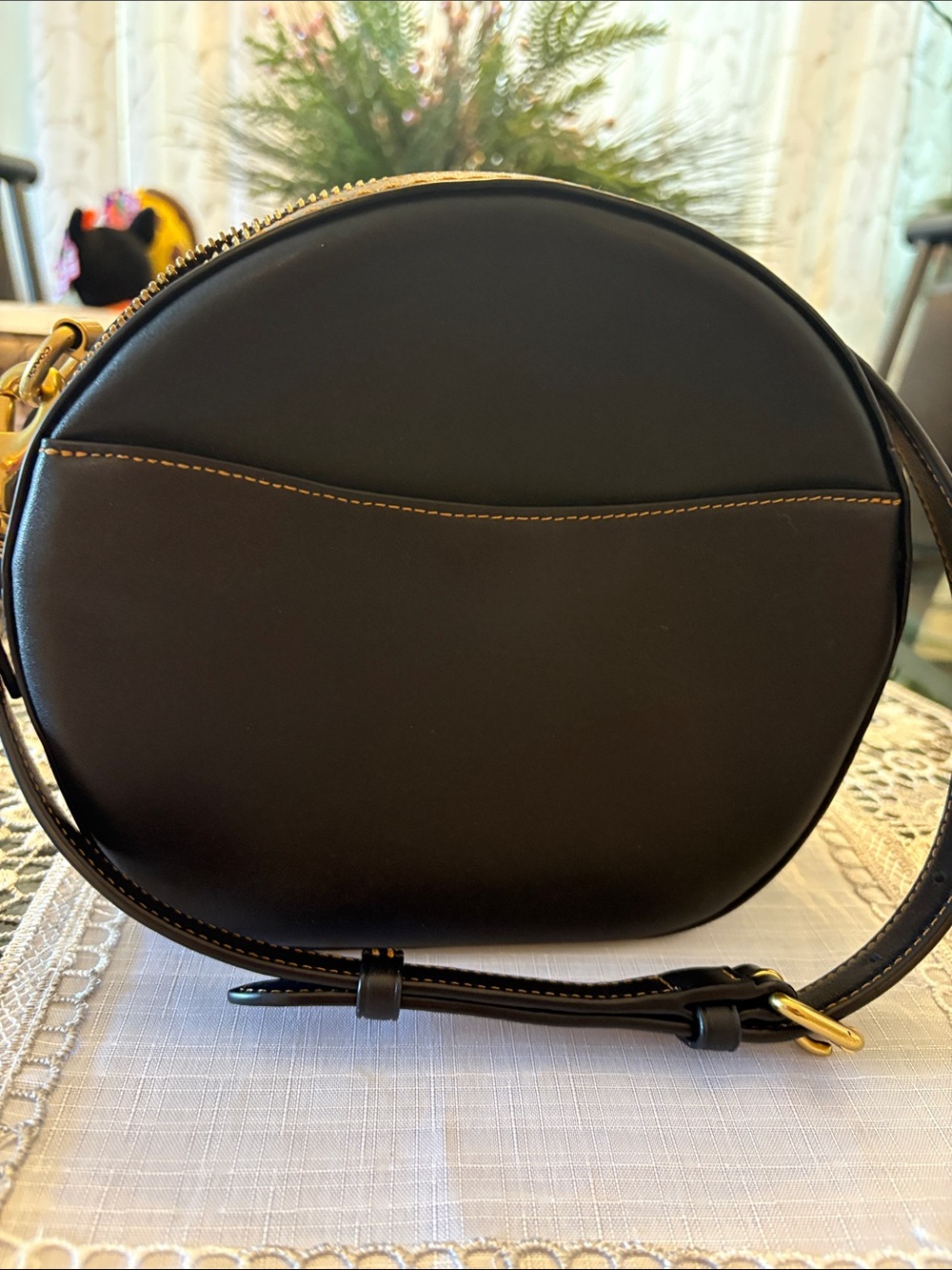 Coach Black Round Crossbody Bag with Gold Hardware
